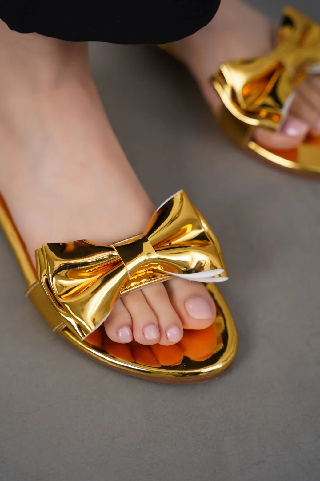 STATEMENT BOW SLIDES